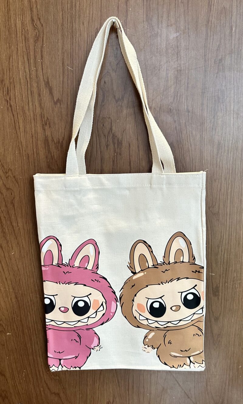 HAPPI BAG:
LABUBUS (ROSA-CAFÉ)